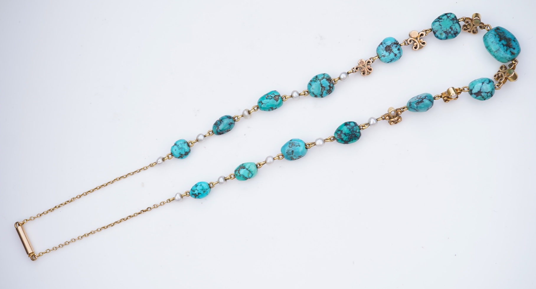 A turquoise and seed pearl necklace, early 20th century